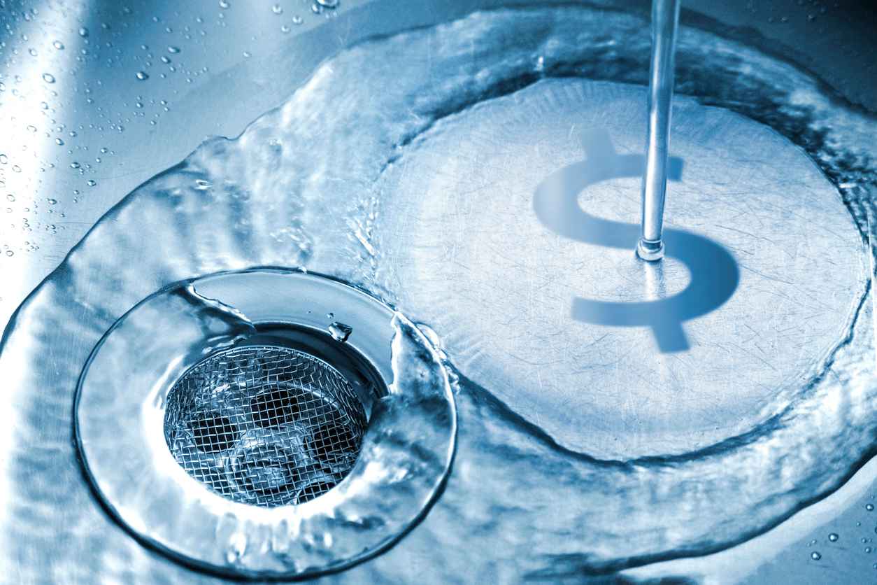 water flowing down the drain with the dollar sign; cost of water